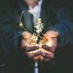 Light bulb in hands